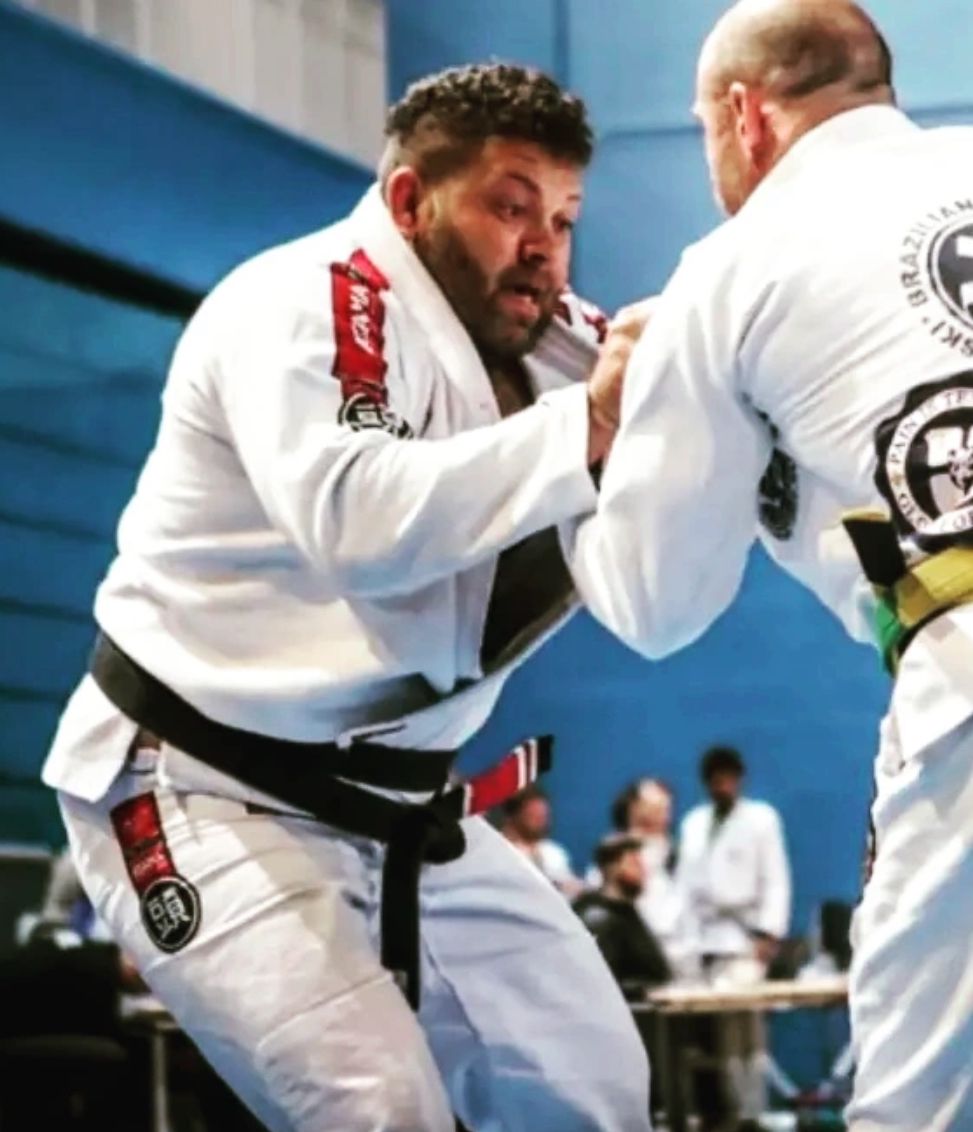 DMT athletes training Brazilian Jiu Jitsu on the mats